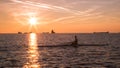 Canoeing in the evening in bay of Trieste Royalty Free Stock Photo