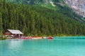 Canoeing on Lake Louise in sunmmer day. Banff National Park, Alberta, Canada. Royalty Free Stock Photo