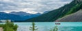 Canoeing on Lake Louise in sunmmer day. Banff National Park, Alberta, Canada. Royalty Free Stock Photo