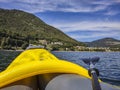 Canoeing on Lake Piazze in Trentino Royalty Free Stock Photo