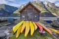 Canoeing in Norway. Fjord landscape with wooden cabin. Recreation Royalty Free Stock Photo