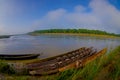 Canoeing safari Wooden rowboats Pirogues on the Rapti river. Chitwan national park, Nepal, fish eye effect Royalty Free Stock Photo