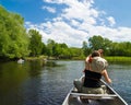 Canoeing on a small river Royalty Free Stock Photo