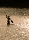 canoeing into the sunset Royalty Free Stock Photo