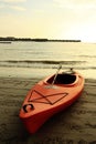 Canoeing on sunset beach Royalty Free Stock Photo