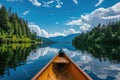 Canoeing on a tranquil lake Royalty Free Stock Photo