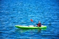 Canoeist in Valletta harbour, Malta.