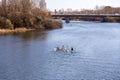 Canoeists paddling through the Tormes River in Salamanca, Spain Royalty Free Stock Photo