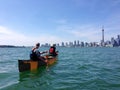 Canoers paddling in front of the Toronto skyline Royalty Free Stock Photo