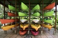 Colorful canoes in rack