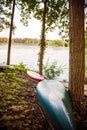 Canoes on the bank of the Charles River in Summer