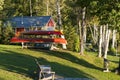 Canoes and cabin in woods Royalty Free Stock Photo