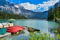 Canoes on a dock at the Beautiful Emerald lake Royalty Free Stock Photo