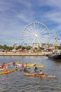 Canoes and ferris wheel at the Kieler Woche festival in Kiel Royalty Free Stock Photo