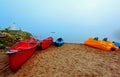 Canoes and kayaks at sunrise Royalty Free Stock Photo