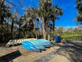 Canoes Lined Up For People To Rent At A State Park In Florida
