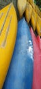 Canoes on the shore waiting for children in the summer camp Royalty Free Stock Photo