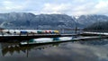 Canoes stored on winter lake Royalty Free Stock Photo