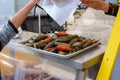 Roasted JalapeÃÂ±os Chile Toreados sit ready to eat at a pork taco booth at the Canoga Park Farmer`s Market on Owensmouth Ave. Royalty Free Stock Photo