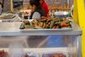 Roasted JalapeÃÂ±os Chile Toreados sit ready to eat at a pork taco booth at the Canoga Park Farmer`s Market on Owensmouth Ave. Royalty Free Stock Photo