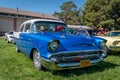 People Enjoying a Beautiful Summer Day Viewing Vintage Cars