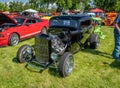 People Enjoying a Beautiful Summer Day Viewing Vintage Cars