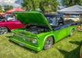 People Enjoying a Beautiful Summer Day Viewing Vintage Cars