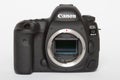 Canon EOS 5D Mark IV profesional DSLR photo camera on white reflective background