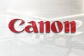 Canon on glossy office wall realistic texture