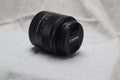 Canon m50 kit lens with cap Royalty Free Stock Photo