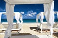 Canopy beds on the sandy beach