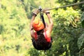 Canopy zip lining tirolesa in Costa Rica Tour Beautiful Girl Royalty Free Stock Photo