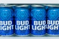 Cans of Bud Light Beer lined up on a shelf in a refrigerator. Royalty Free Stock Photo
