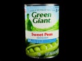 Cans of Green Giant Sweet Peas on Black Background