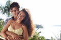 Cant keep their hands off. Portrait of an affectionate young couple on holiday. Royalty Free Stock Photo