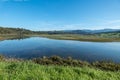 Cantabria landscape with field, mountains, river. Spain