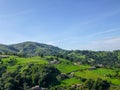 Cantabria landscape with field, mountains and a small village. Spain