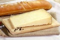 Cantal cheese and baguette on the table