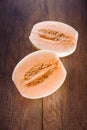 Cantaloupe or Charentais melon with half