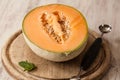 Cantaloupe Half On Wood Cutting Board Royalty Free Stock Photo