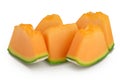 Cantaloupe melon pieces isolated on white background with full depth of field. Royalty Free Stock Photo