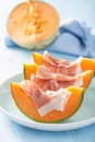 Cantaloupe melon with prosciutto. italian appetizer