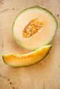 Cantaloupe melon slice and one half Royalty Free Stock Photo