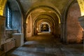Long corridor in the underground crypt of the historic Canterbury Cathedral Royalty Free Stock Photo