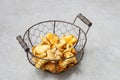 Golden chanterelle. Mushrooms in wire basket. Royalty Free Stock Photo