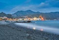 Large metal cranes in Riva Trigoso Shipyard during summer night