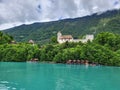 Scenic view of Iseltwald village on Lake Brienz shore. Royalty Free Stock Photo