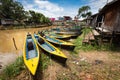 Yellow canoe boats. Inle Boat Station in Inle Nyaung Shwe Canal.