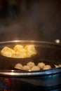 Cantonese morning tea dim sum is being cooked in a steamer in a Chinese kitchen Royalty Free Stock Photo