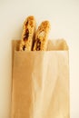 Cantucci cookies with candied fruits and nuts in a paper bag. White background Royalty Free Stock Photo